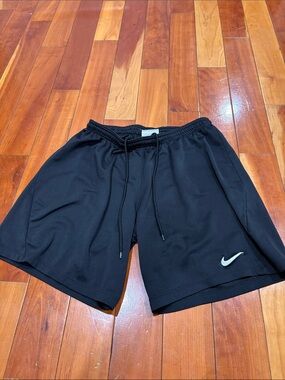 Nike Women’s Black Athletic Shorts with White Swoosh